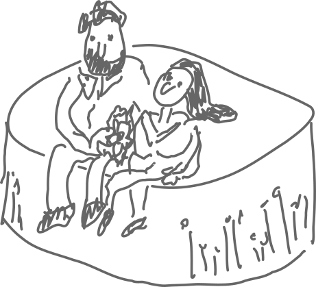 An illustration of a wedding cake with two people as cake toppers